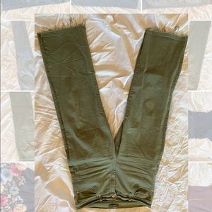 Flared green high waisted denim jeans